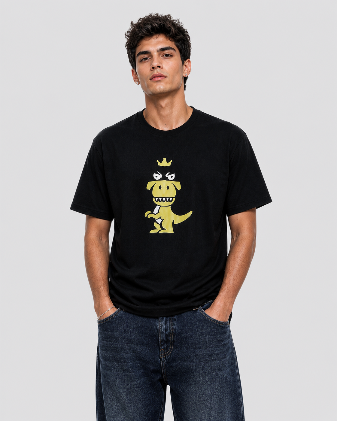 Man wearing black Regno T-Rex Latro pima cotton graphic tee with lime green T-Rex design, upper body shot