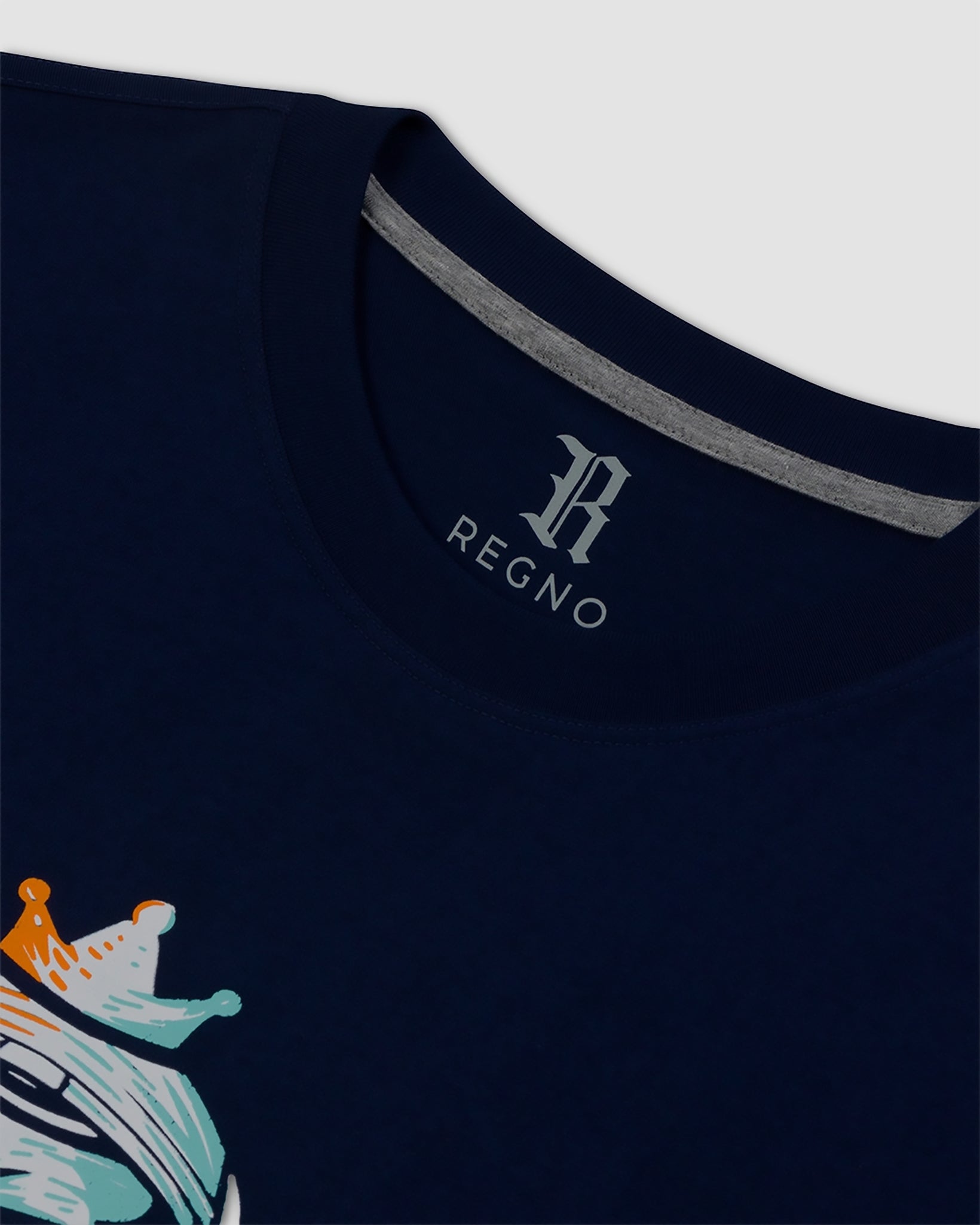 Close-up of cosmic orange white and blue astronaut T-Rex graphic on navy pima cotton t-shirt by Regno, detail shot